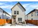 Two-story house with a fenced backyard and patio area at 518 N Beville Ave, Indianapolis, IN 46201