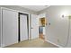 Bedroom with double door closet and laundry access at 5617 Yucatan Dr, Indianapolis, IN 46237