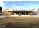 Spacious backyard featuring a sunroom addition and offering potential for outdoor enjoyment at 6327 E 52Nd Pl, Indianapolis, IN 46226