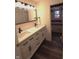 Modern bathroom with double vanity, quartz countertop, and updated fixtures at 6327 E 52Nd Pl, Indianapolis, IN 46226