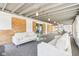 Bright sunroom with large windows, dining area, and sitting area with white couches at 6327 E 52Nd Pl, Indianapolis, IN 46226