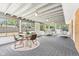Bright sunroom with large windows, dining area, and sitting area at 6327 E 52Nd Pl, Indianapolis, IN 46226