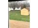 Backyard with shed, deck, and fenced area at 707 Spring Valley Ct, Indianapolis, IN 46231