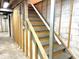 Basement steps with wood framing and concrete block foundation walls at 8104 Cheswick Dr, Indianapolis, IN 46219