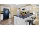 Modern white kitchen with black appliances at 818 W Broadway St, Alexandria, IN 46001