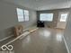 Living room with tile flooring and large windows, under renovation at 913 N Tremont St, Indianapolis, IN 46222