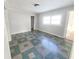 Spacious bedroom with neutral walls and unique patterned flooring at 107 E Garfield St, Alexandria, IN 46001