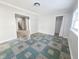 Living room with neutral walls, carpet flooring, and views to the upper level at 107 E Garfield St, Alexandria, IN 46001