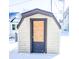 Small shed with a boarded-up door at 107 E Garfield St, Alexandria, IN 46001