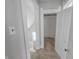 Upper hallway with staircase and access to an additional room at 107 E Garfield St, Alexandria, IN 46001