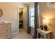 Bright bedroom with window, closet, and dresser at 10968 Gossamer Ln, Noblesville, IN 46060