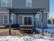 Covered patio with seating area and string lights at 10968 Gossamer Ln, Noblesville, IN 46060