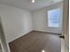 Bedroom featuring a large window, carpet floors, and neutral paint at 11275 N Quillow Way, Monrovia, IN 46157