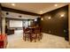 Finished basement with a table and chairs, perfect for board games or card games at 12596 Autumn Gate Way, Carmel, IN 46033