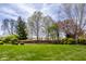 Welcome to The Lakes at Hazel Dill, a picturesque community with lush landscaping and a welcoming entrance sign at 12596 Autumn Gate Way, Carmel, IN 46033
