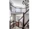 Grand foyer with a staircase, beautiful chandelier, and front door with sidelight windows at 12596 Autumn Gate Way, Carmel, IN 46033