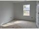 Bright bedroom with a large window at 13359 Vickery Ridge Dr, Fishers, IN 46037