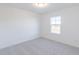 Bright bedroom with neutral walls and carpet, featuring a large window at 13359 Vickery Ridge Dr, Fishers, IN 46037