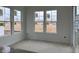 Bright breakfast nook surrounded by large windows at 13359 Vickery Ridge Dr, Fishers, IN 46037