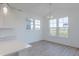 Bright dining area with hardwood floors and large windows at 13359 Vickery Ridge Dr, Fishers, IN 46037