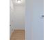 Bright hallway with light wood flooring and neutral walls at 13359 Vickery Ridge Dr, Fishers, IN 46037