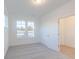 Simple office with grey carpet, white walls, and a door to another room at 13359 Vickery Ridge Dr, Fishers, IN 46037
