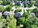 An aerial view of the neighborhood, showcasing mature trees and manicured lawns at 13650 Golden Ridge Ln, Fishers, IN 46055