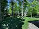 Well maintained backyard offers a scenic outdoor setting at 13650 Golden Ridge Ln, Fishers, IN 46055