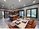 Spacious dining area with a view to the kitchen with stainless steel appliances at 13650 Golden Ridge Ln, Fishers, IN 46055