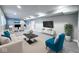Spacious finished basement area with plenty of seating and a fireplace at 13650 Golden Ridge Ln, Fishers, IN 46055