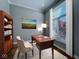 Office with a desk, bookshelf, and natural light at 13650 Golden Ridge Ln, Fishers, IN 46055