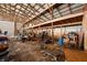 Messy barn interior with wood beams and open space, suitable for storage, projects, or a workshop at 1600 S Morgantown Rd, Morgantown, IN 46160