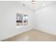 Bright bedroom with a large window overlooking a serene outdoor view and recessed lighting overhead at 1600 S Morgantown Rd, Morgantown, IN 46160