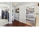 Main bathroom with toilet, closet, and bedroom access at 1655 Arbor Springs Dr, Brownsburg, IN 46112