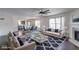 Spacious living room featuring hardwood floors, a fireplace, and ample natural light at 1715 Danielle Rd, Lebanon, IN 46052