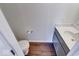 Small powder room with toilet, sink, and vanity at 1715 Danielle Rd, Lebanon, IN 46052