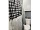 Bathroom with black and white checkered shower curtain at 1733 N Buck Creek Rd, Greenfield, IN 46140