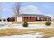 Brick ranch house with attached garage, snowy yard at 18333 N State Road 9, Summitville, IN 46070