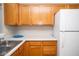 Kitchen corner sink and oak cabinets at 1941 Acorn Dr, Franklin, IN 46131