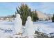 Snowy backyard with two playful snowmen at 2367 Heartland Ln, Brownsburg, IN 46112