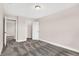 Bright bedroom with carpet, and two doors to a closet and another room at 250 Ambassador Dr, Pittsboro, IN 46167