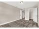 Spacious bedroom with carpet, and doors opening to a closet and another room at 250 Ambassador Dr, Pittsboro, IN 46167