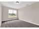 Spacious bedroom with large window and plush carpeting at 250 Ambassador Dr, Pittsboro, IN 46167