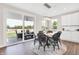Bright breakfast nook with patio access and a round table set at 250 Ambassador Dr, Pittsboro, IN 46167
