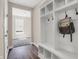 White built-in bench with cubbies in entryway at 250 Ambassador Dr, Pittsboro, IN 46167