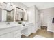 Double vanity bathroom with a walk-in shower and plenty of storage at 250 Ambassador Dr, Pittsboro, IN 46167