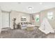 Bright playroom with teepee, sofa, and ample space for  at 250 Ambassador Dr, Pittsboro, IN 46167