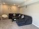 Comfortable finished basement featuring a sectional sofa, cozy seating, and a spacious layout at 251 Dyson Dr, Whiteland, IN 46184