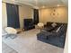 Finished basement with an entertainment area, comfortable seating, and a large sectional sofa at 251 Dyson Dr, Whiteland, IN 46184