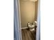 Small half bathroom with a toilet and pedestal sink at 251 Dyson Dr, Whiteland, IN 46184